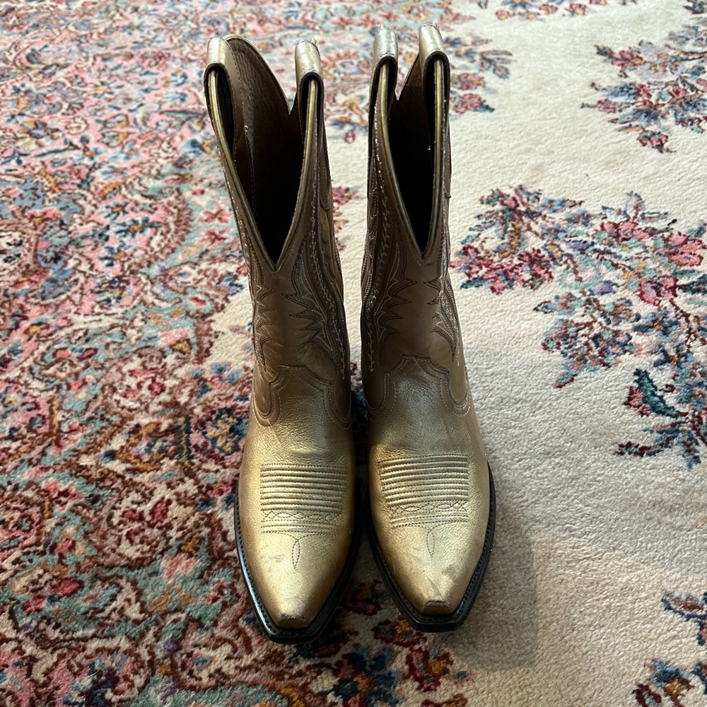 Women’s gold Ariat cowboy boots